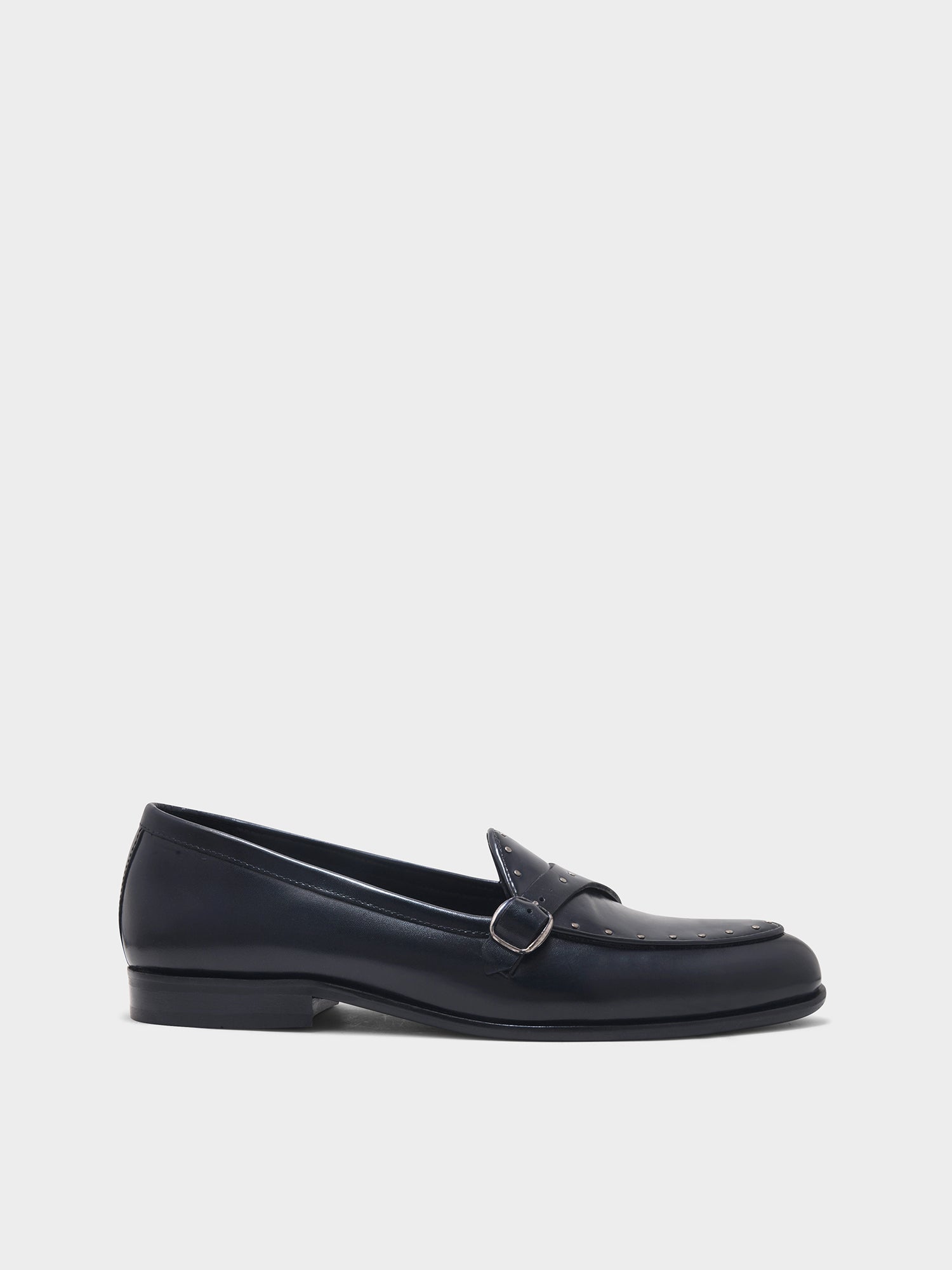 Black loafer shoe on a white background