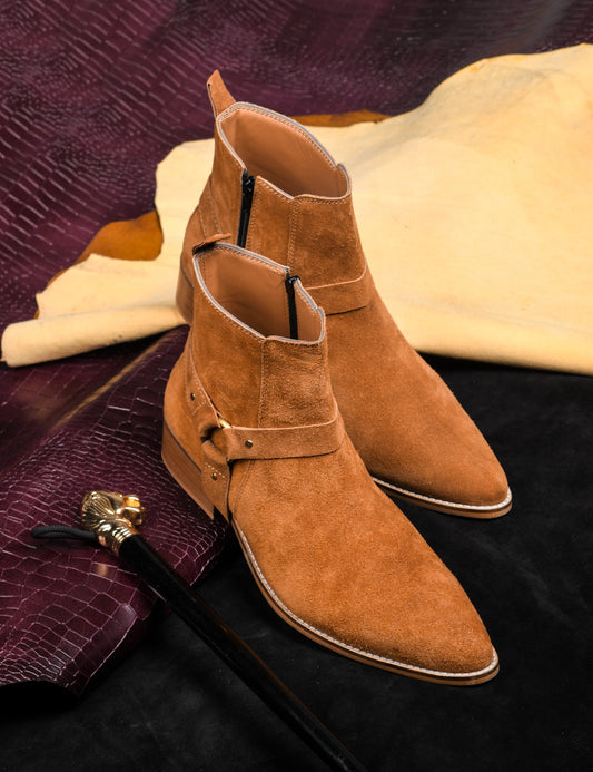 Pair of tan suede boots on Cuban heel with tan coloured buckle on side with golden accents