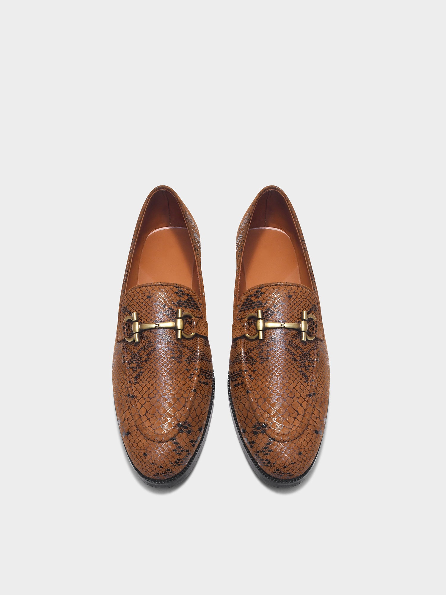 Brown snake-patterned penny loafer shoe on mid heel with a horsebit buckle